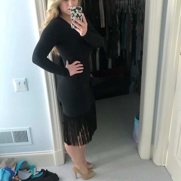 Neiman Marcus Dresses & Skirts - Black Neiman Marcus dress with fringe at bottom